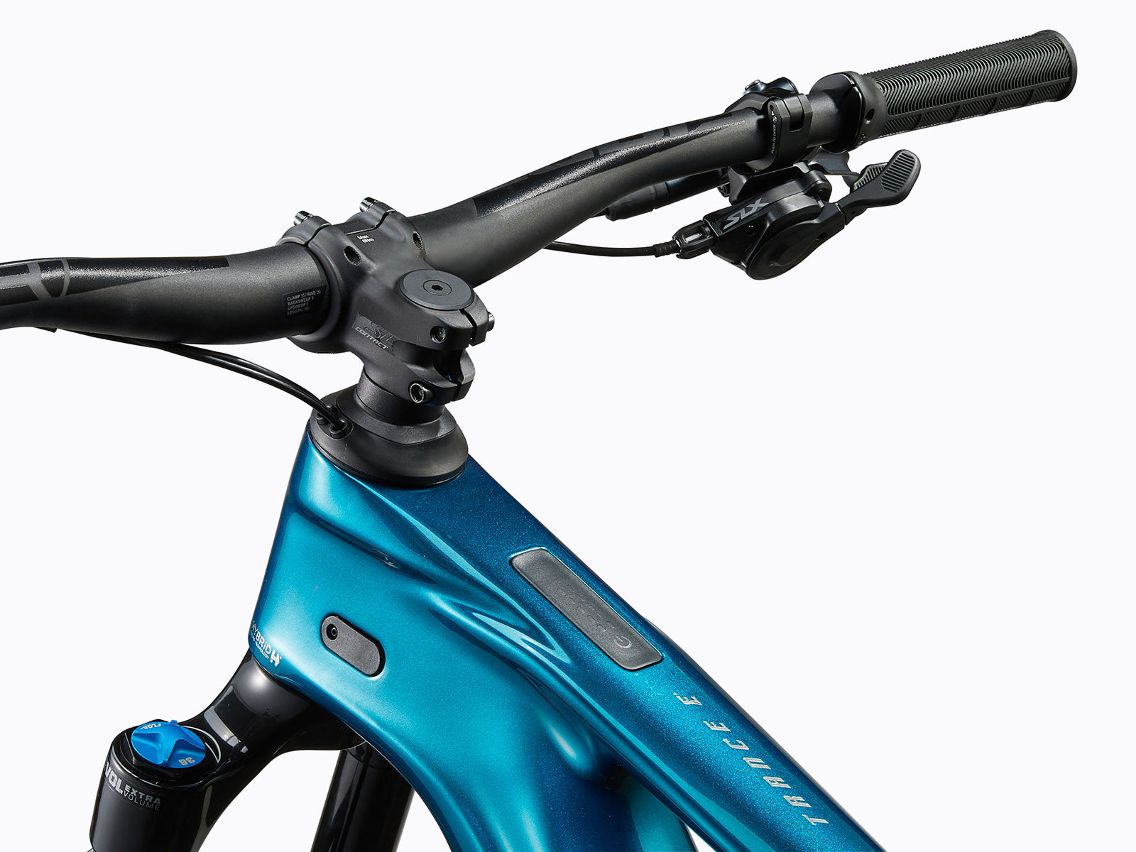 Detailed view of a mountain bike's handlebar and stem, highlighting the grips and design for enhanced rider comfort and control.