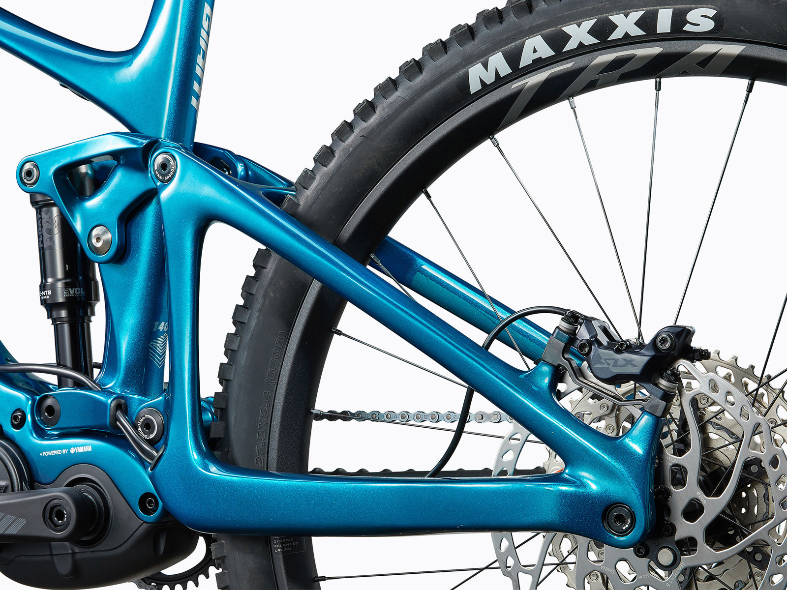 A mountain bike displaying its chain and chainring, illustrating the essential parts for performance on rough terrains.